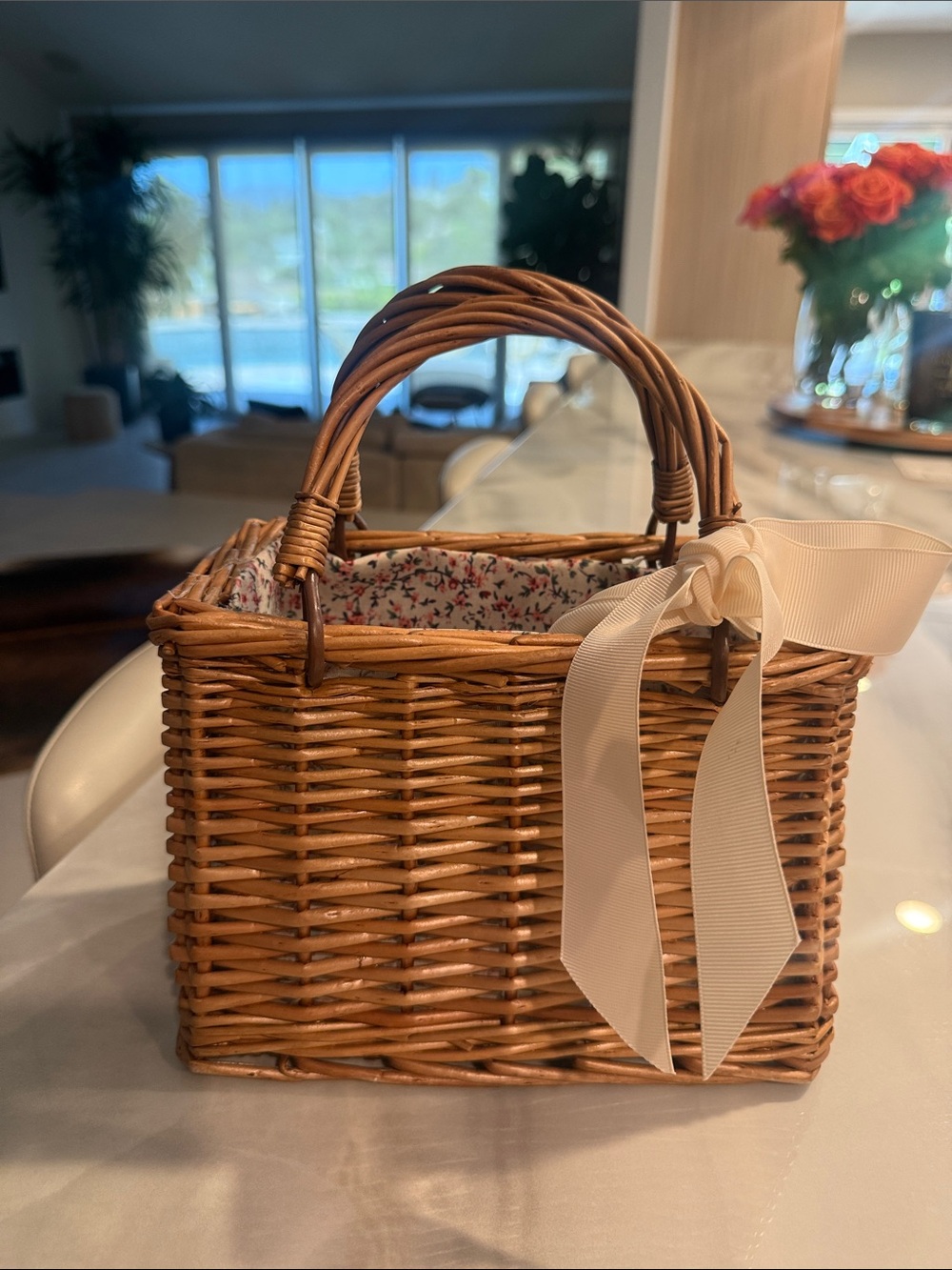 Woven Rattan Basket Handbag with Floral Liner and White Bow